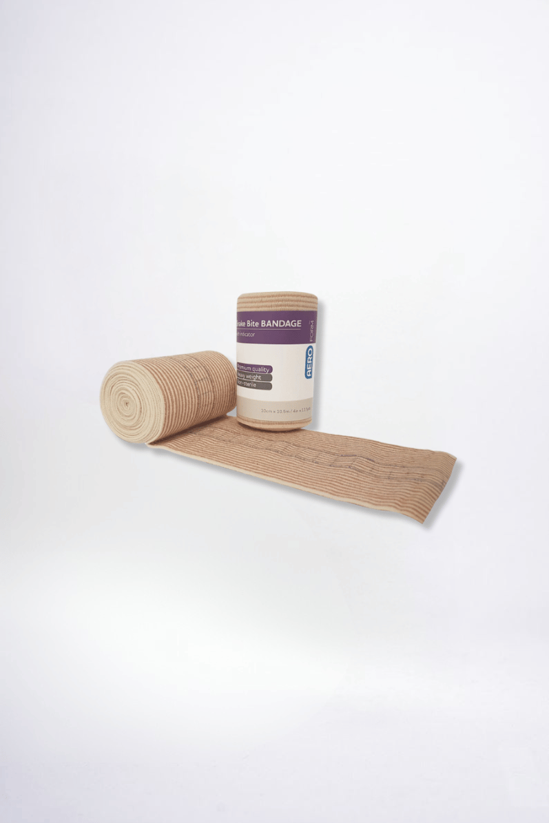 Roll of brown elastic bandage on a white background