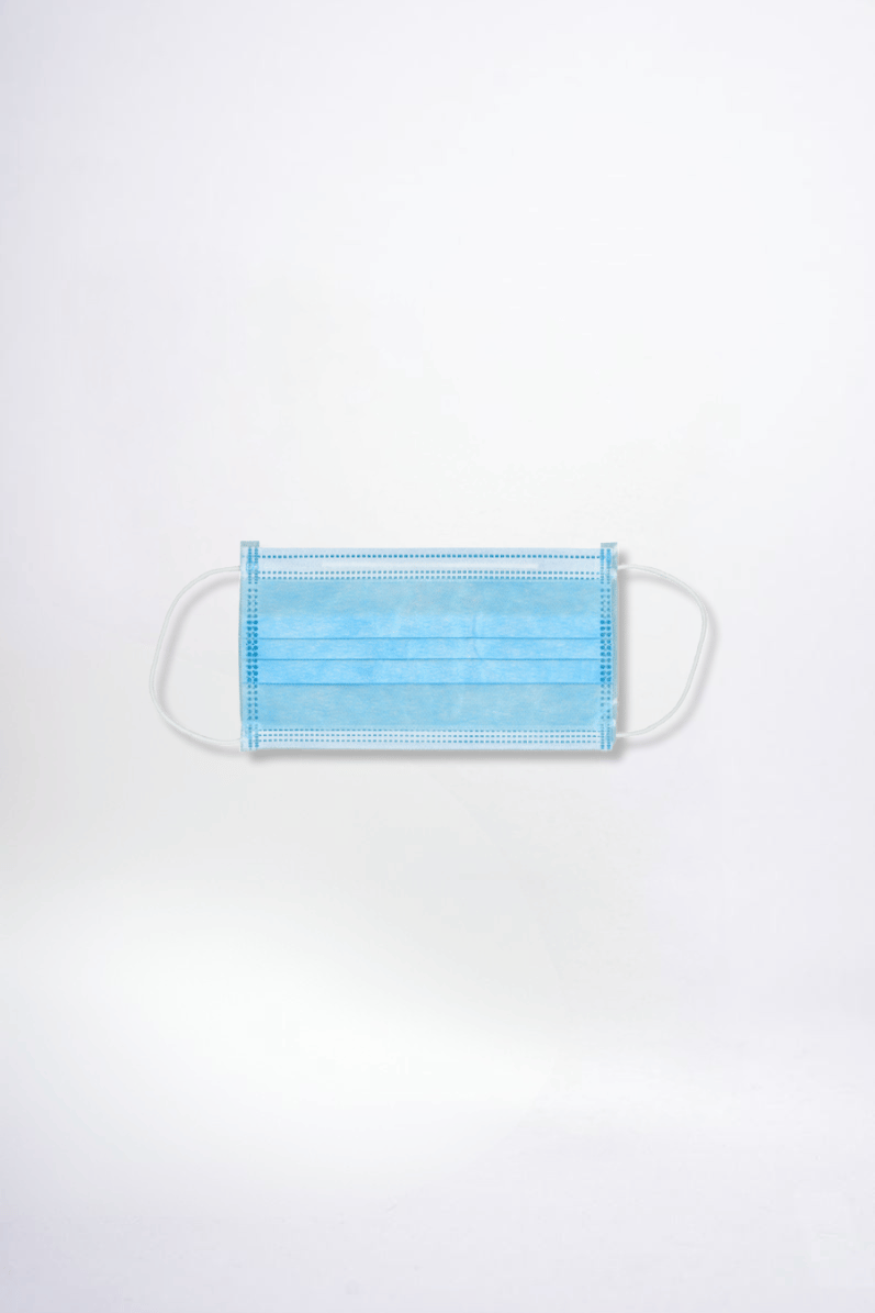 Blue surgical mask on a white background